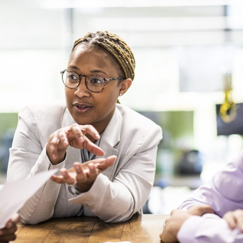 Businesswoman leading office discussion 1620x1080